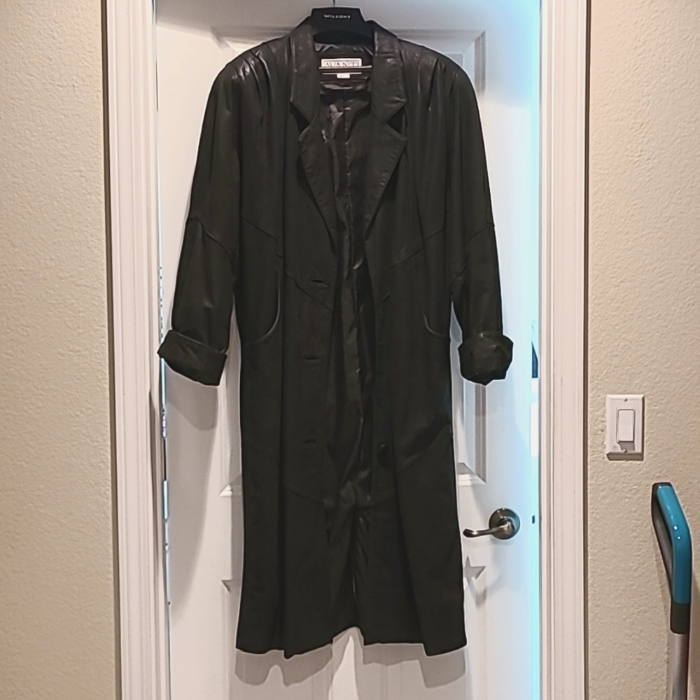 Black leather woman's coat. Calf length, medium from Wilson house of Leather.